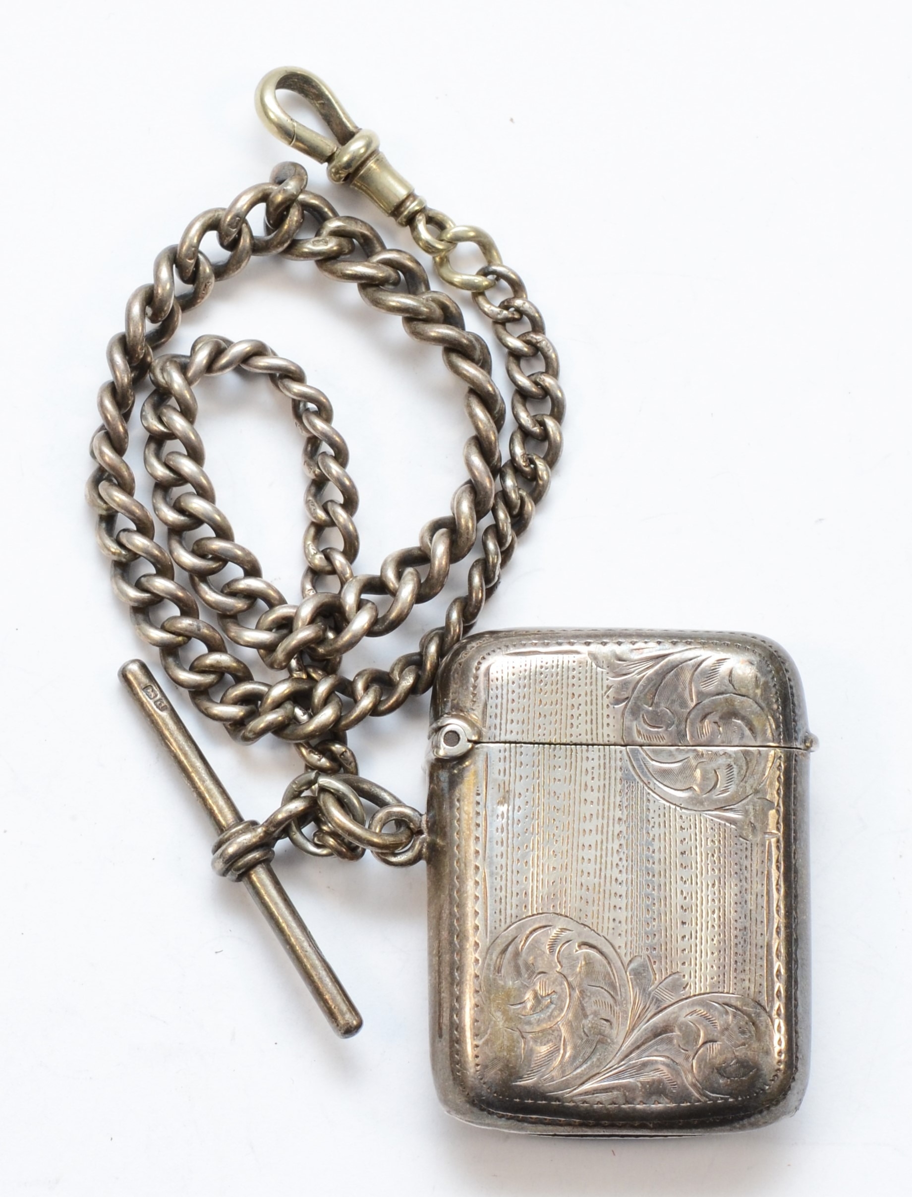 An Edward VII silver rounded rectangular vesta case, by Joseph Gloster, Birmingham 1903, on a silver - Image 2 of 3