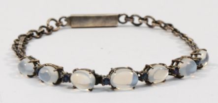 A silver moonstone and sapphire bracelet, unmarked, 20cm, 6gm.