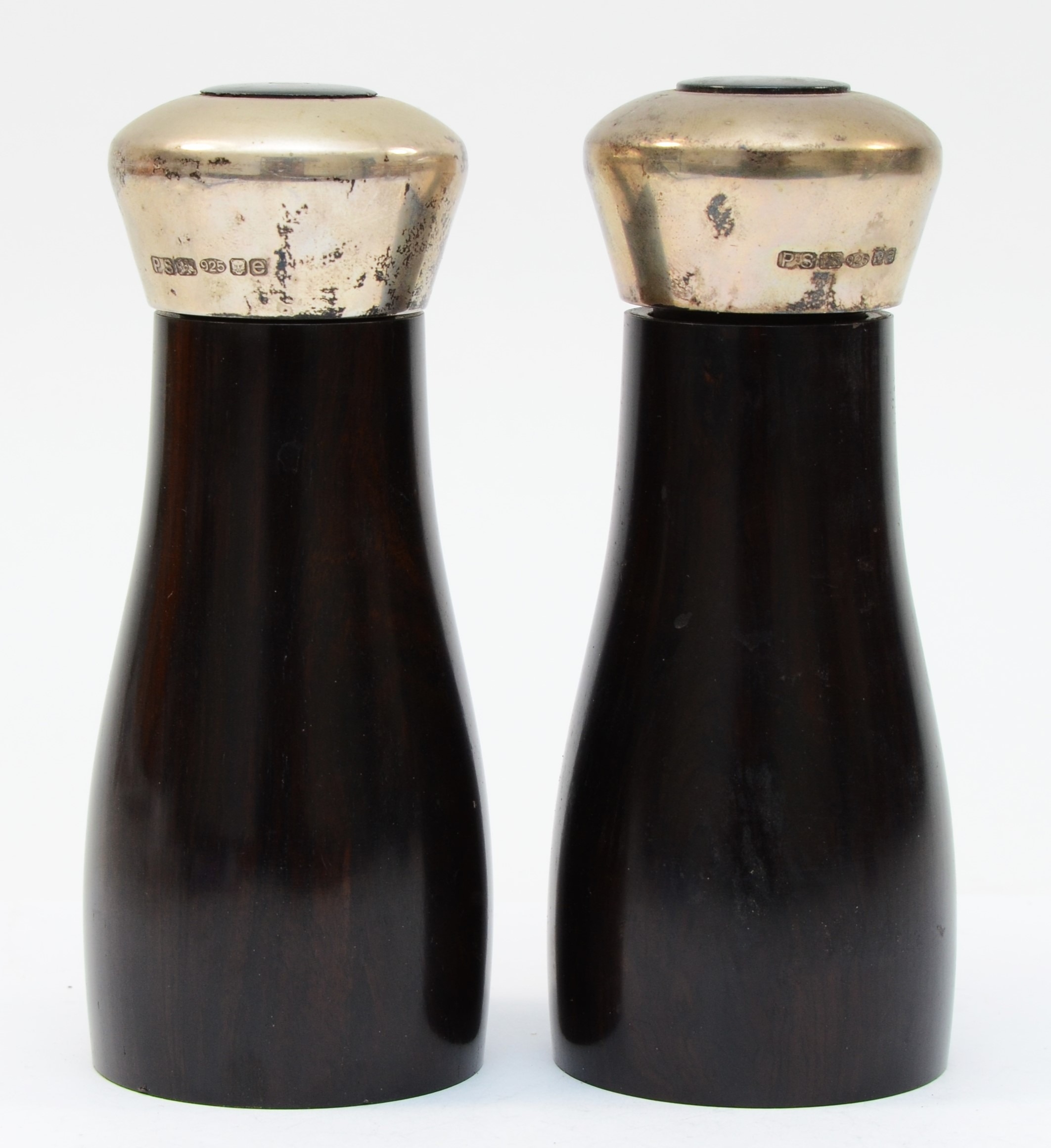 A pair of silver topped salt and pepper grinders, by Practical Silverware, London 2004, 13.5cm.