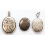 A Victorian silver brooch locket inscribed Jean, Birmingham 1878, 40mm, together with two