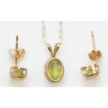 A 9k gold peridot pendant, on a 375 gold chain, 12mm, together with a pair of unmarked gold