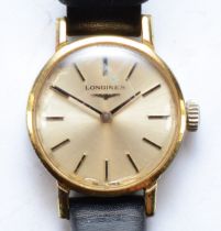 Longines, a gold plated Ladies wrist watch, set with baton numerals, seventeen unadjusted