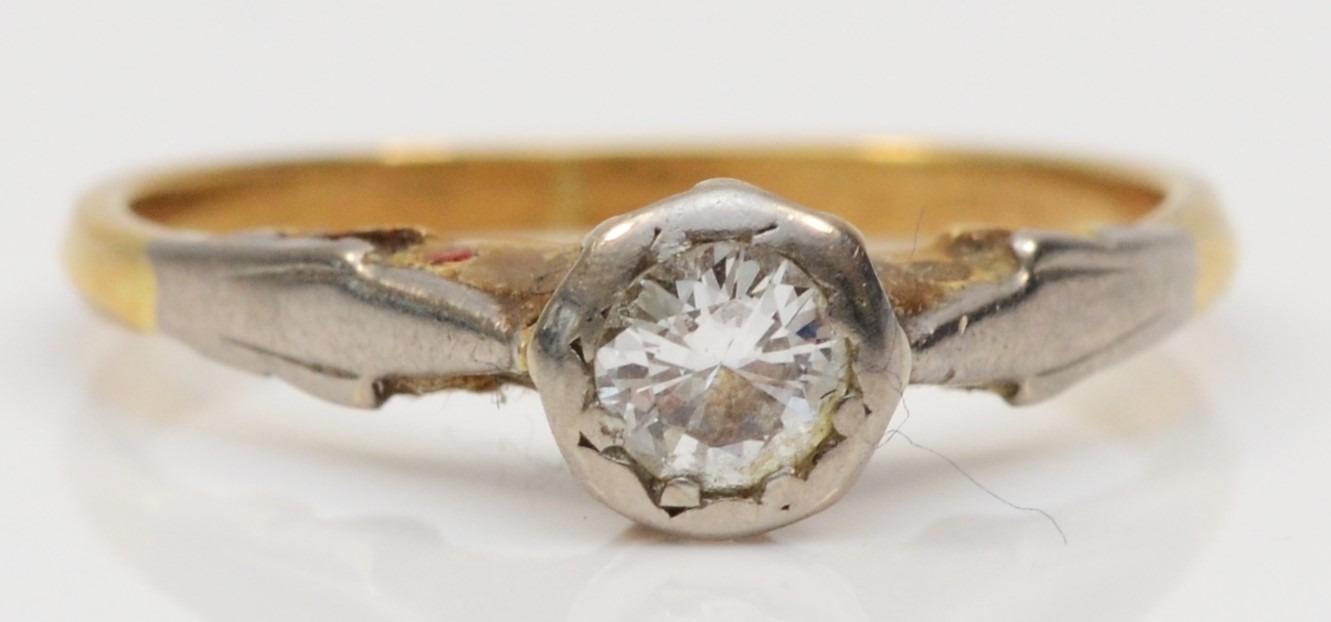 A gold single stone brilliant cut diamond dress ring, unmarked, estimated weight .20, J-K, 1.8gm.
