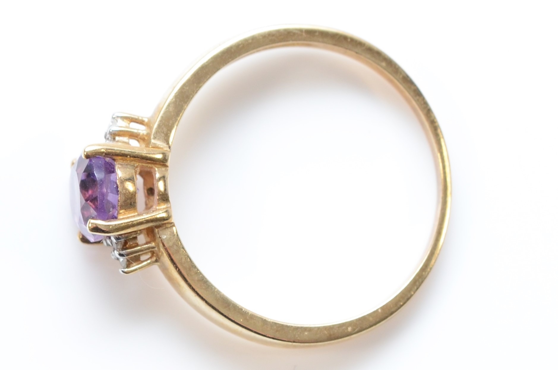 A 9ct gold oval cut amethyst and eight cut diamond dress ring, Q, 2.6gm. - Bild 2 aus 2