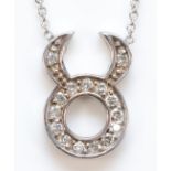 A 14k white gold eight cut diamond Taurus zodiac necklace, 41cm, 2.4gm.