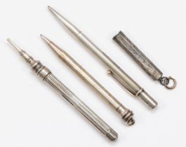 Three silver bodied pencils to include a Eversharp example, and a George V silver pencil holder,