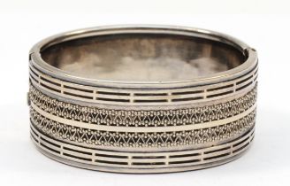 A Victorian silver hinged bangle, unmarked, with bead and wire decoration, 55mm, 35gm.