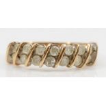 A 9ct gold seven row brilliant cut diamond dress ring, P, 3gm.