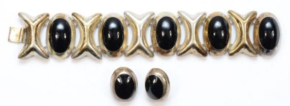 A Mexican silver black hard stone bracelet and matching earrings, by Taxco, 19.5cm, 113gm.