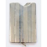 A 20th century silver plated sprung calling card case, with engine turned decoration, 8.5 x 5.5cm.