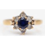 A 9ct gold sapphire and white stone floral cluster ring, H-I, 1.3gm.