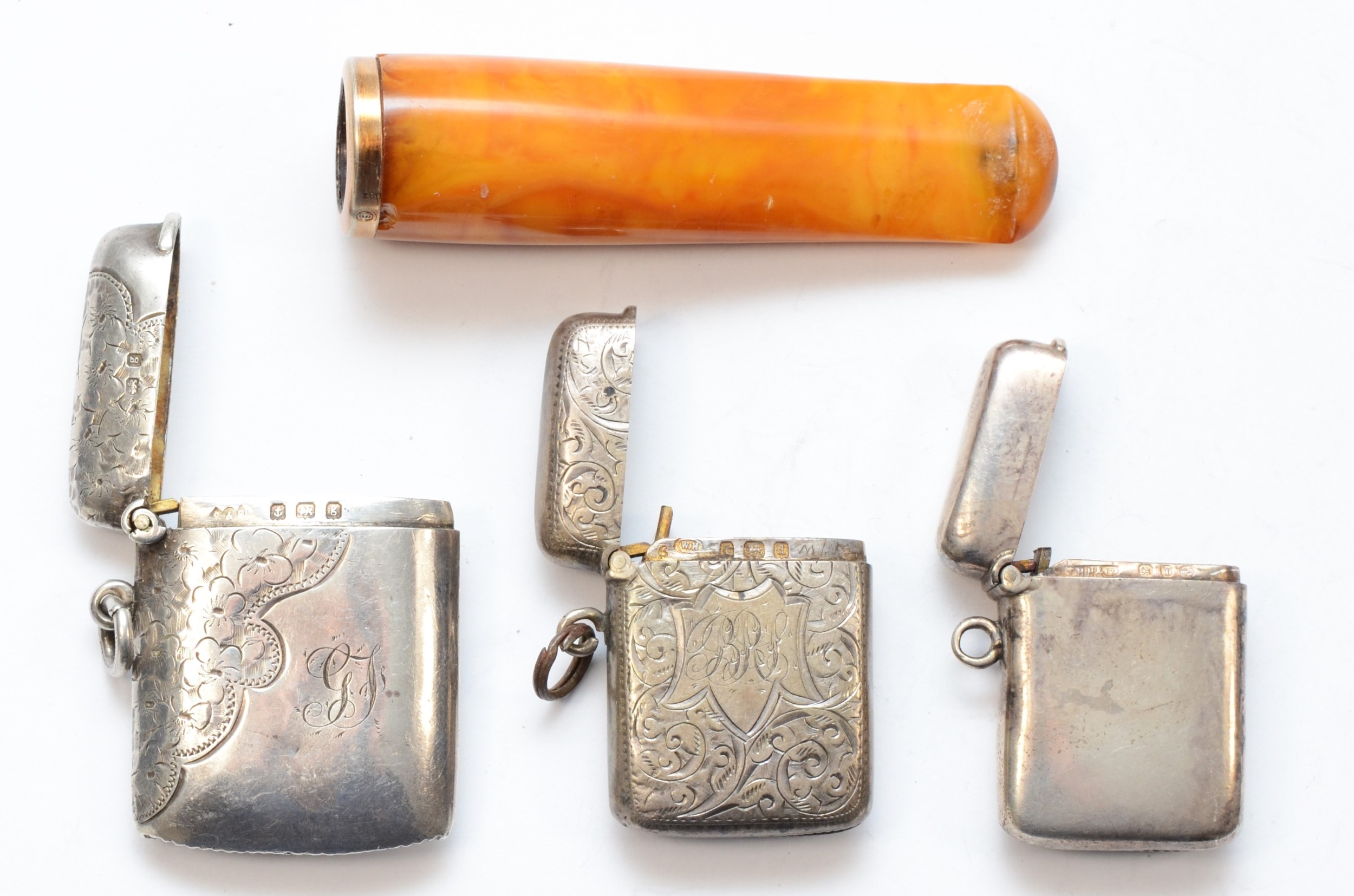 Three silver rectangular vesta cases, Birmingham 1896, 1903, 1906, 53gm, together with a German - Image 3 of 3