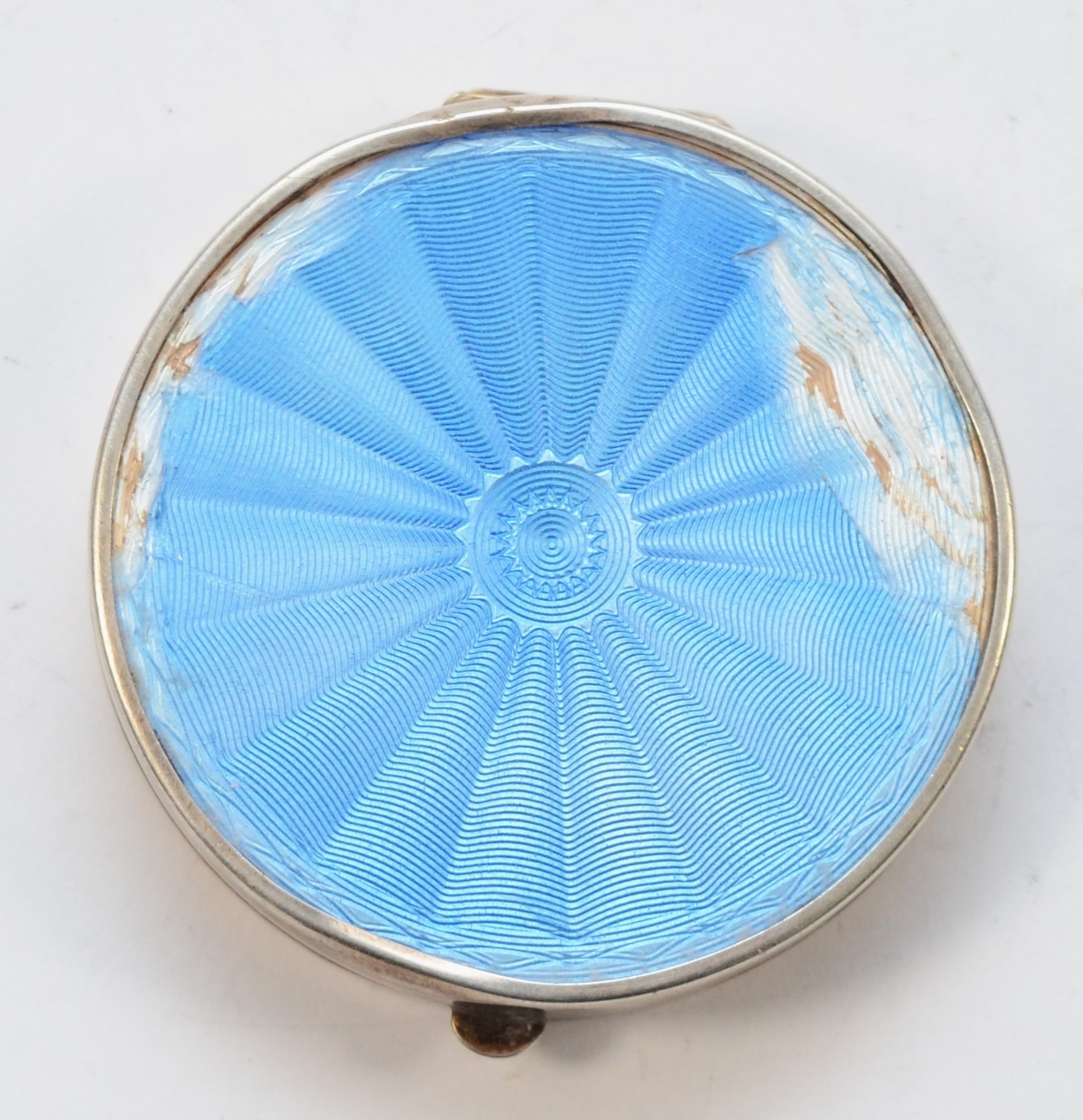 A George V silver and guilloché enamel compact, by Charles S Green, Birmingham 1928, 5cm, 35gm.