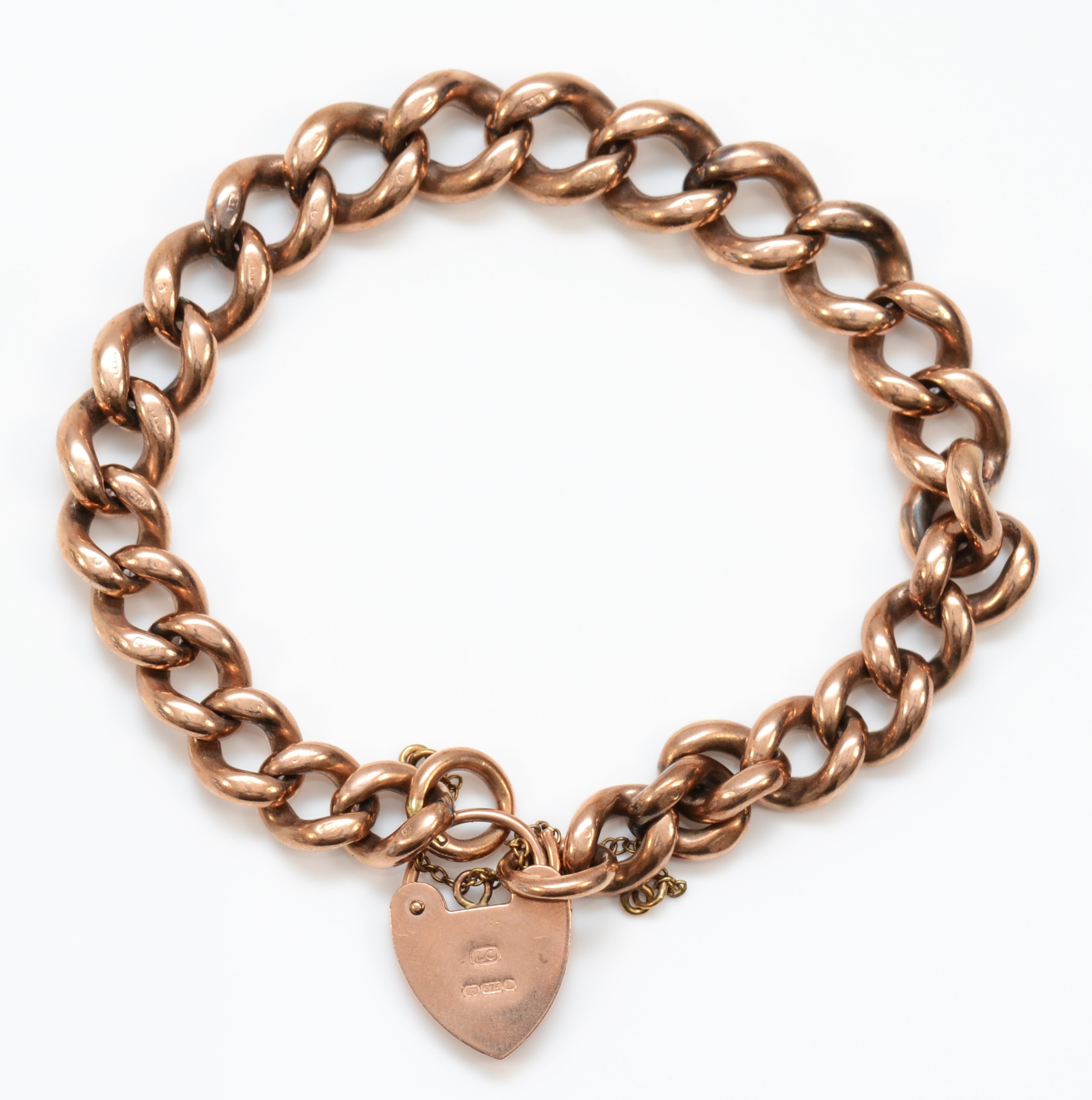 A 9ct rose gold curb link heart padlock clasped bracelet, 47gm. - Image 2 of 2
