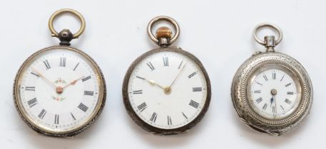 Three Victorian silver fob watches to include a Birmingham 1885 example, two 800 silver cased fob