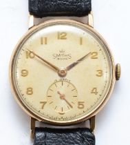 Smiths De Luxe, a 9ct gold cased Gentleman's wrist watch, the dial set with Arabic numerals and