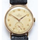 Smiths De Luxe, a 9ct gold cased Gentleman's wrist watch, the dial set with Arabic numerals and