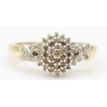 A 585 gold eight cut diamond cluster ring, N-O, 3.6gm, one diamond missing to the shoulder.