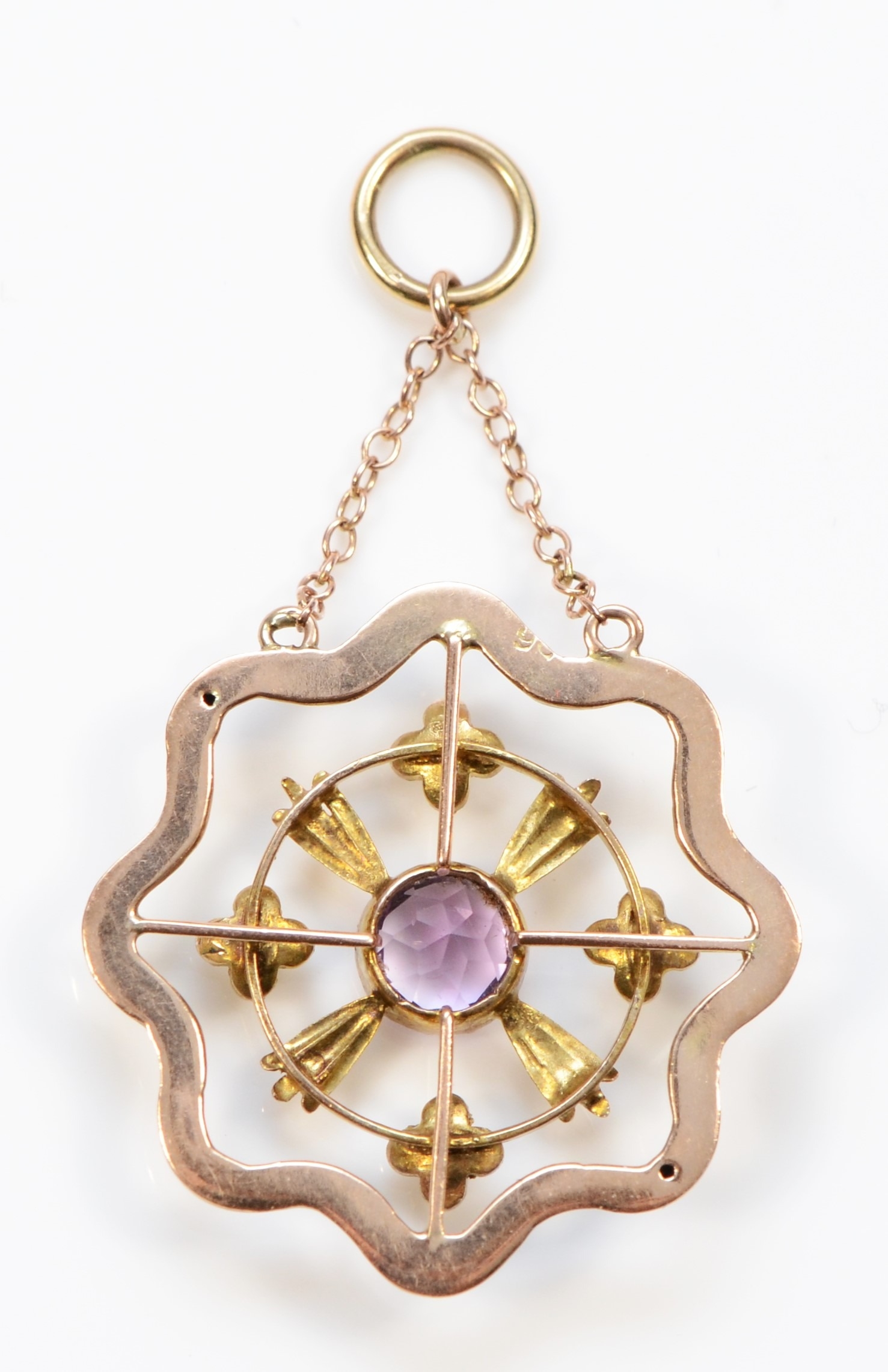 An Edwardian 9ct gold amethyst and seed pearl open work drop pendant, 45 x 25mm, 2gm. - Bild 2 aus 2