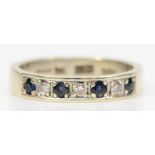 A 9ct white gold sapphire and brilliant cut diamond dress ring, L-M, 3.3gm.