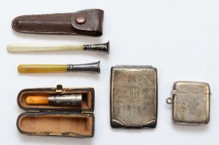 A group of silver items to include a George V silver match book holder, Birmingham 1928, a silver