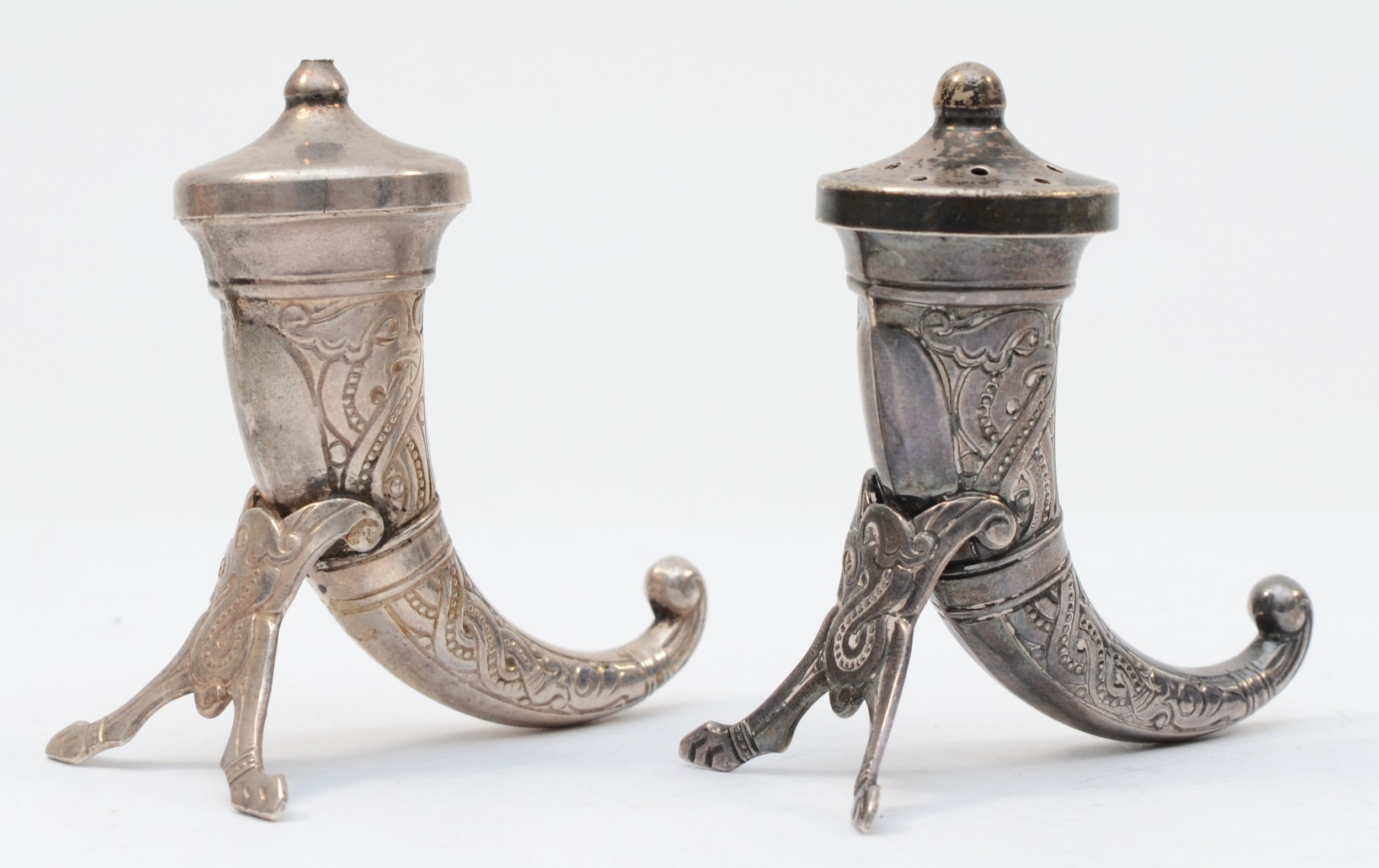 A pair of Norwegian silver Viking drinking horn salt and pepper shakers, by Theodore Olsen, 6 x 5cm,