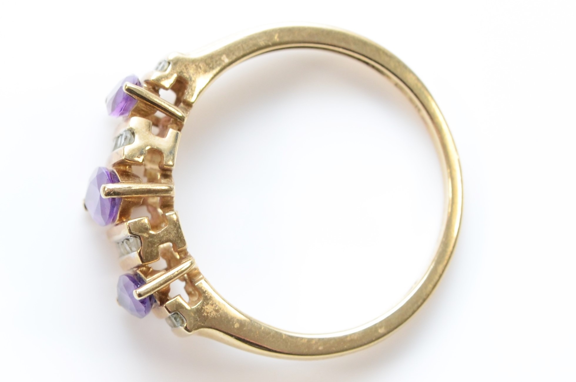 A 9ct gold three stone amethyst and eight cut diamond dress ring, R, 2.8gm. - Bild 2 aus 2