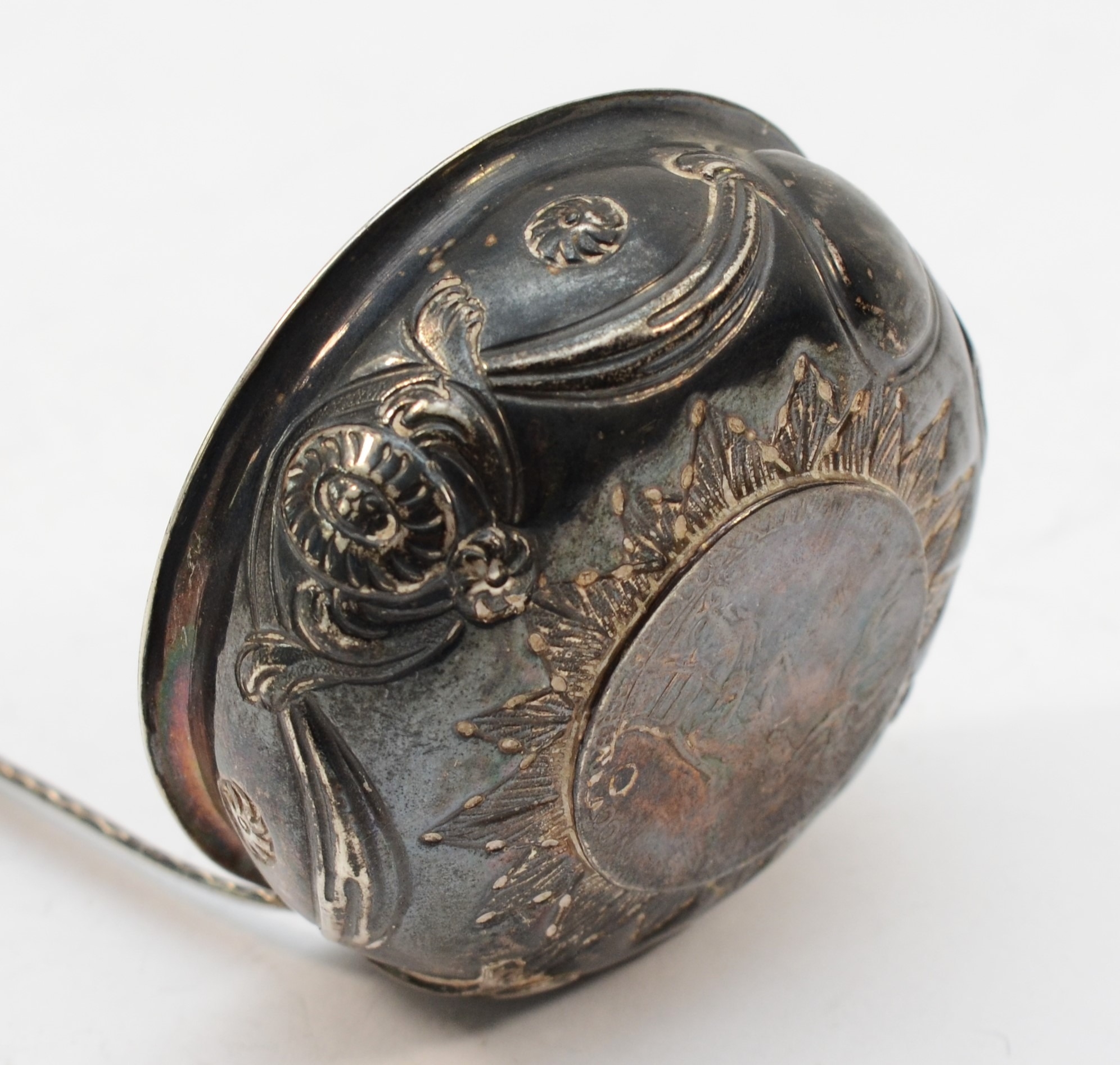 A Georgian silver toddy ladle, unmarked, with embossed swag decoration and Charles II coronation - Image 3 of 3