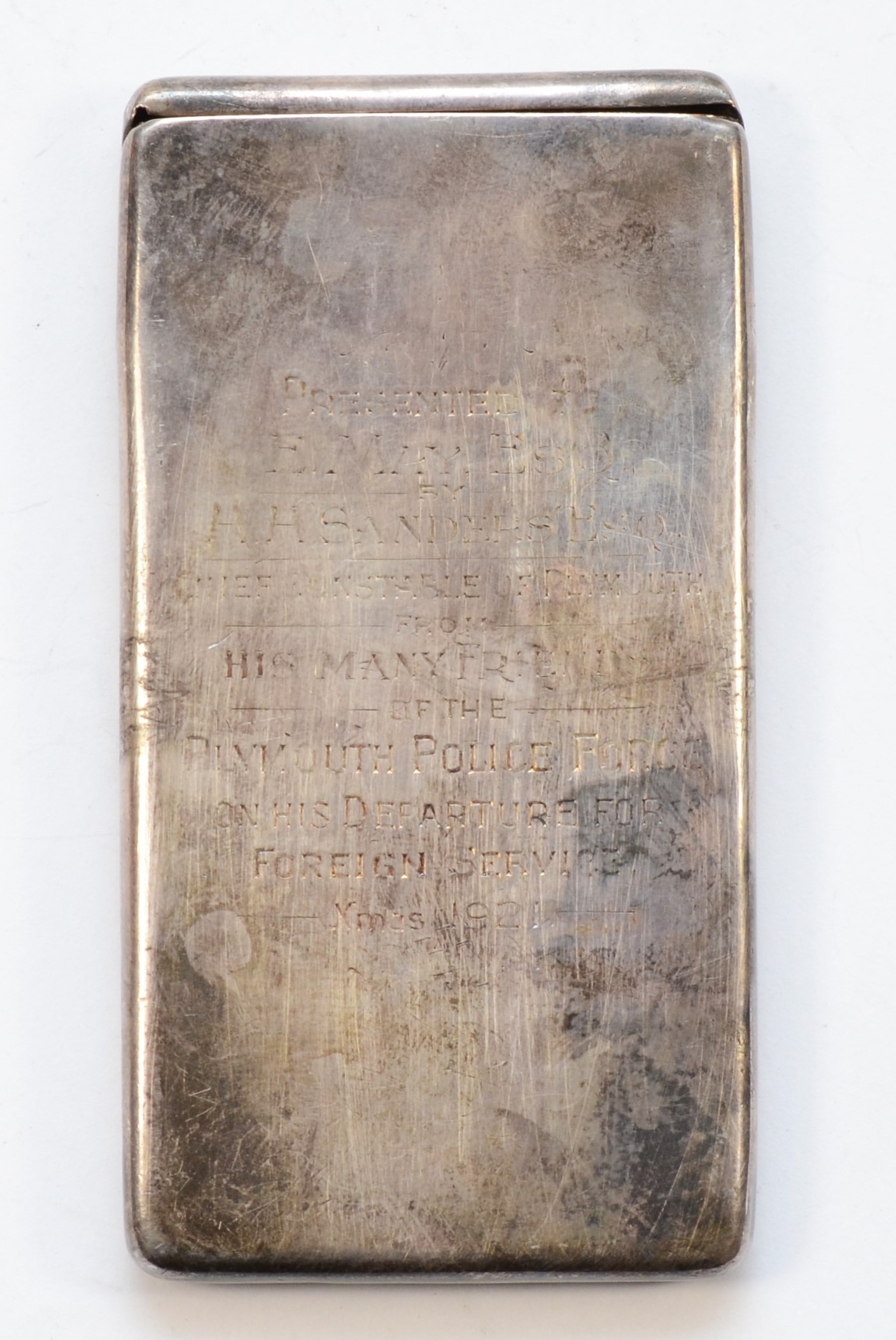 A George V silver calling card case, by Sampson Mordan & Co, London 1919, inscribed Presented to, E.