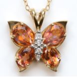 A 9ct gold mystic topaz and cubic zirconia butterfly pendant, on unmarked chain, 17 x 16mm, 2.8gm.