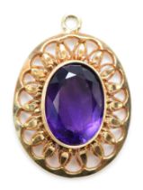 A vintage 9ct gold amethyst pendant, with pierced decoration, 30 x 23mm, 5.5gm.