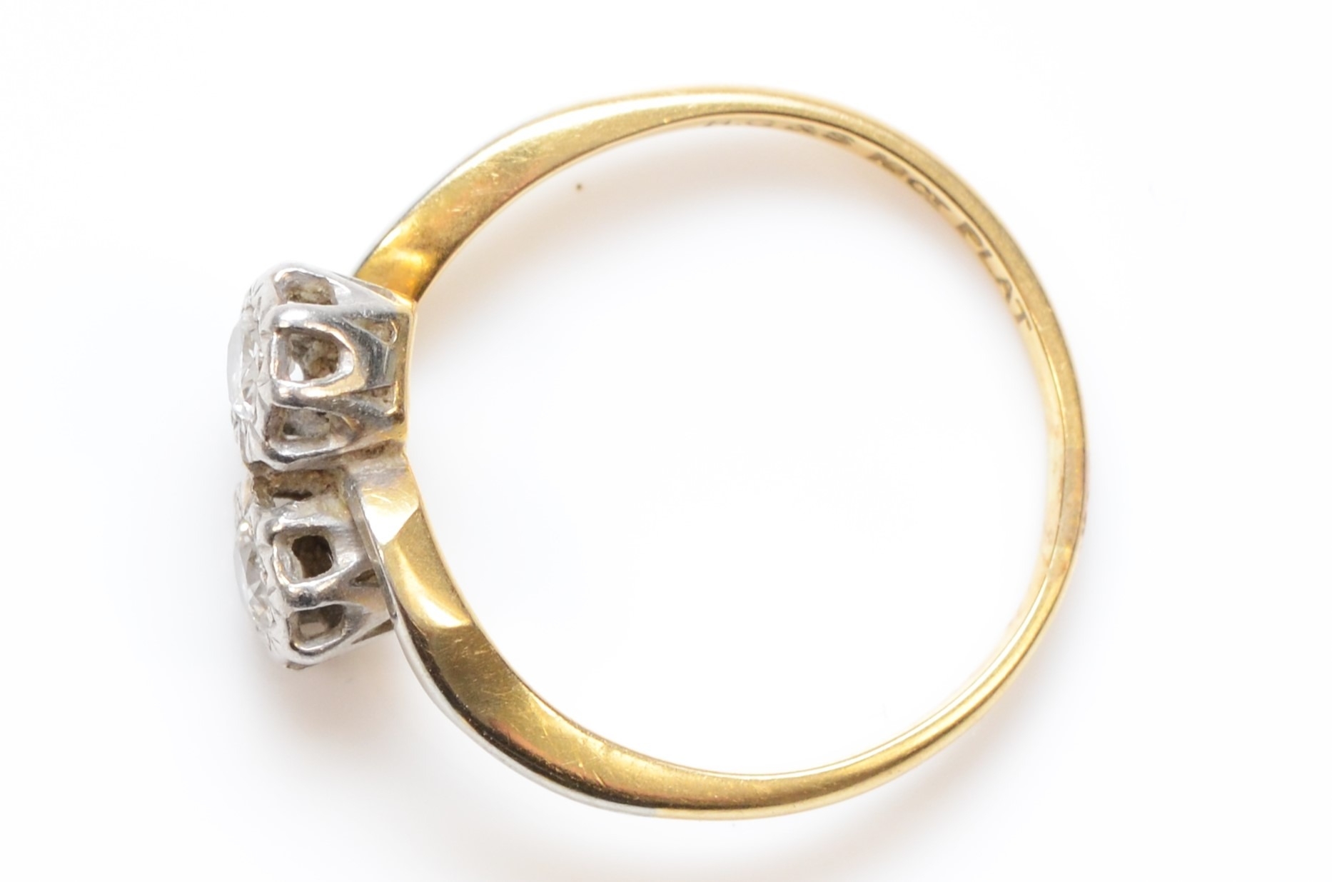 An 18ct gold and platinum illusion set brilliant cut diamond dress ring, M-N, 2.6gm. - Image 2 of 2