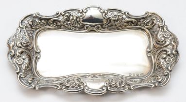 A Victorian silver embossed calling card tray, by George Unite, Birmingham 1876, with pierced