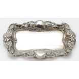A Victorian silver embossed calling card tray, by George Unite, Birmingham 1876, with pierced