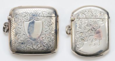 An Edwardian silver rounded square vesta case, Birmingham 1904, together with another vesta,