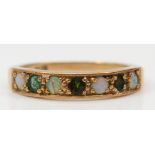 A 9ct gold opal and emerald dress ring, P, 2.5gm.