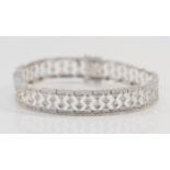 A 9ct white gold eight cut diamond bracelet, stated weight .50, 18cm, 12.2gm.