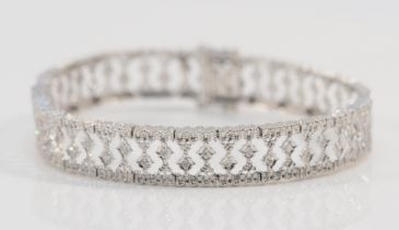 A 9ct white gold eight cut diamond bracelet, stated weight .50, 18cm, 12.2gm.