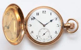 Dennison, a 9ct gold hunter key less wind pocket watch, Birmingham 1929, the enamel dial set with