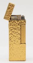 Dunhill, a gold plated rectangular gas lighter, US.RE24163, 6.5 x 2.5cm.