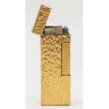 Dunhill, a gold plated rectangular gas lighter, US.RE24163, 6.5 x 2.5cm.