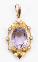 An Edwardian gold amethyst and seed pearl openwork pendant, unmarked, 35mm, 2.8gm.