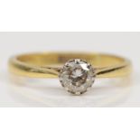 An 18ct gold and platinum set single stone brilliant cut diamond ring, estimated weight .30, K-L,