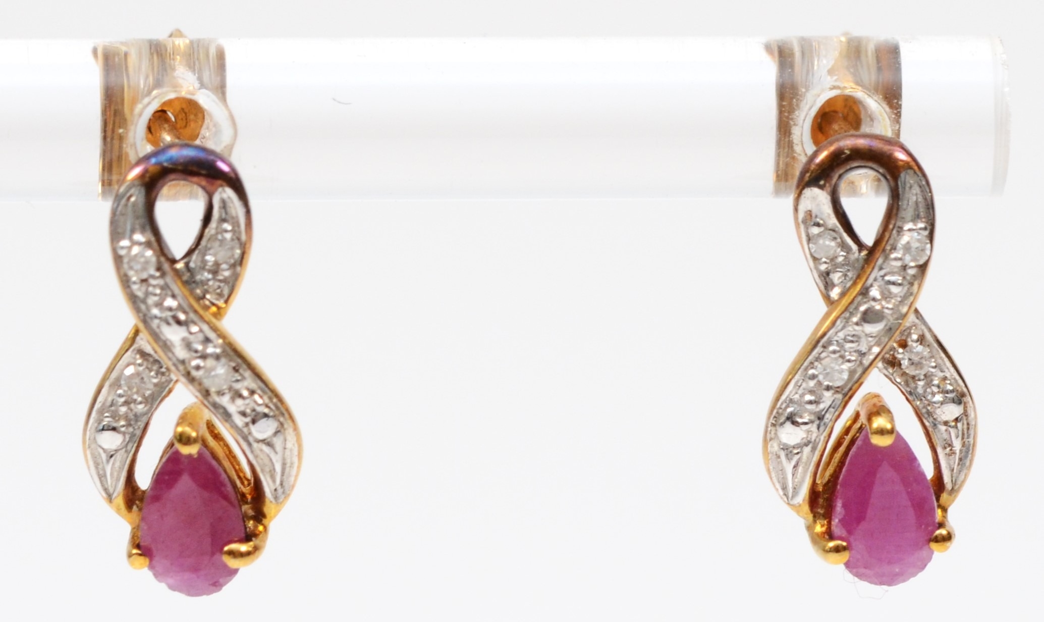 A pair of 9ct gold ruby and eight cut diamond drop earrings, 13mm, 1.3gm.