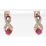 A pair of 9ct gold ruby and eight cut diamond drop earrings, 13mm, 1.3gm.