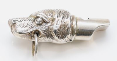 A vintage silver plated dog head whistle, unmarked, 5cm, 10gm.