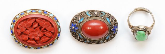 A Chinese export silver gilt and enamel cinnabar floral brooch, 33mm, together with a silver jadeite