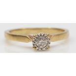 A 9ct gold illusion set brilliant cut diamond dress ring, stated weight .10, H, 1.5gm.