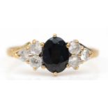 A 9ct gold sapphire and white stone dress ring, K, 1.3gm.