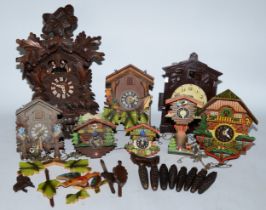 A selection of six cuckoo clocks, having manual wind movements for spares or repair.